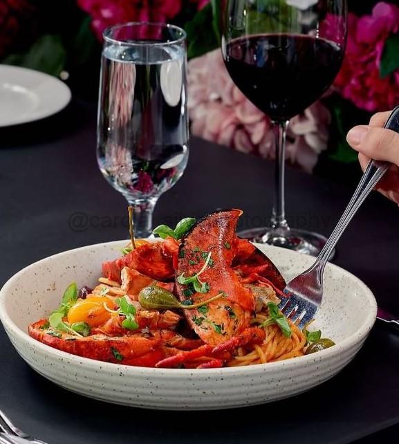 Nova Scotia lobster spaghetti puttanesca with capers and chilies
